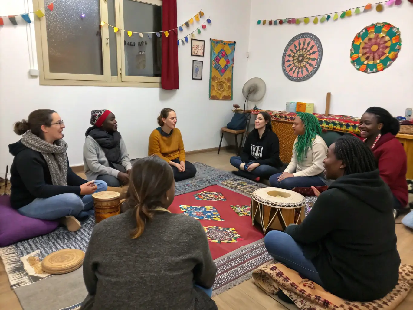 A group of BAL & ART participants engaged in a language exchange program, practicing conversational skills and sharing cultural insights in a relaxed and interactive setting.